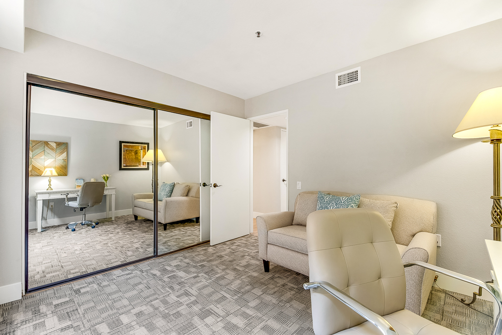 living room with sofa and chair